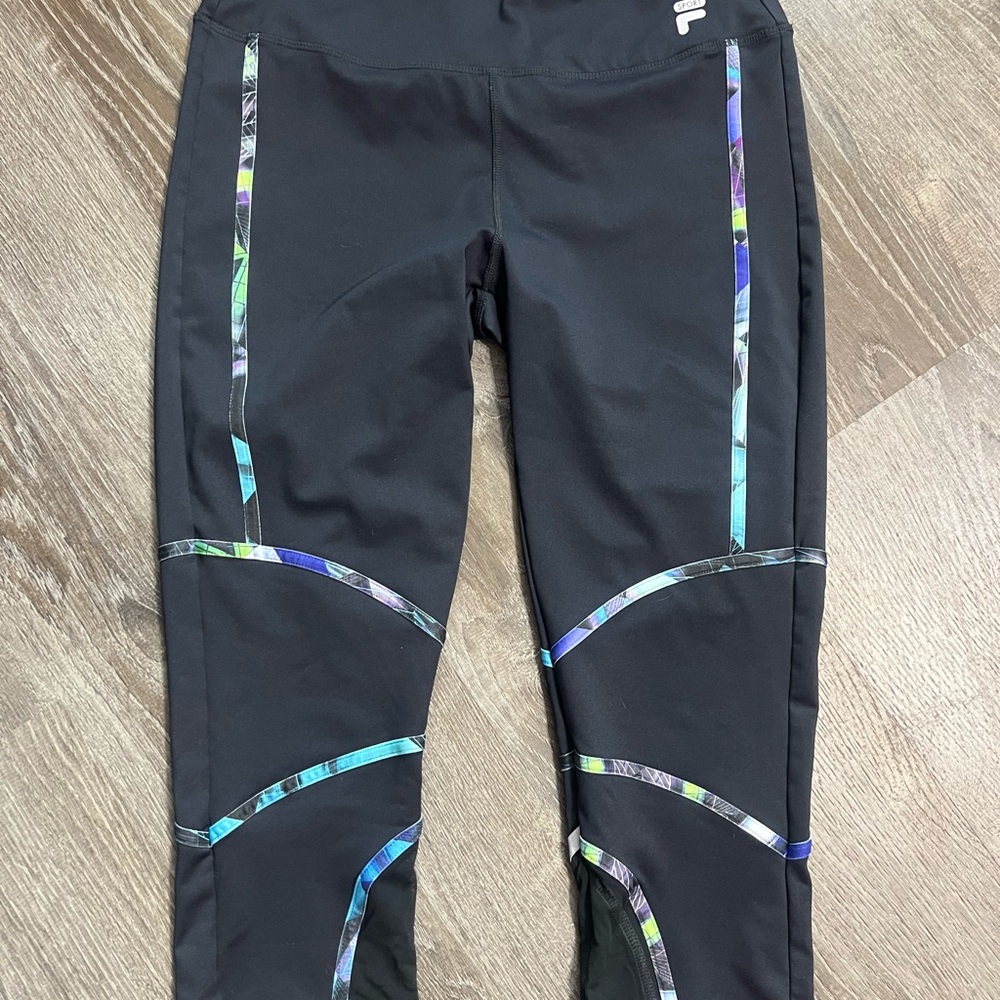 Fila capri length leggings with multi color pattern trim.